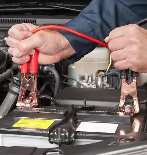 connecting jumper cables to jump start car