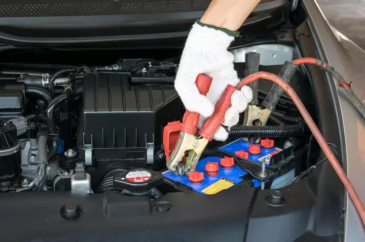 connecting battery cables to jump start car