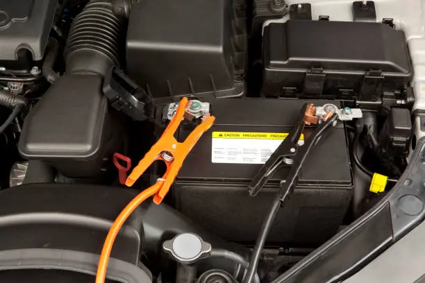 connected cables with dead battery to jump start